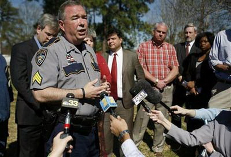 Baton Rouge Sgt. Don Kelly meets with the media outside the Louisiana Technical College on Feb. 8, 2008. (Xinhua/AP Photo)