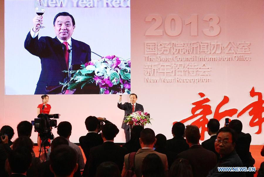 Wang Chen, director of China's State Council Information Office, addresses during the New Year reception held by the China's State Council Information Office in Beijing, capital of China, Dec. 18, 2012. (Xinhua/Li Fangyu)