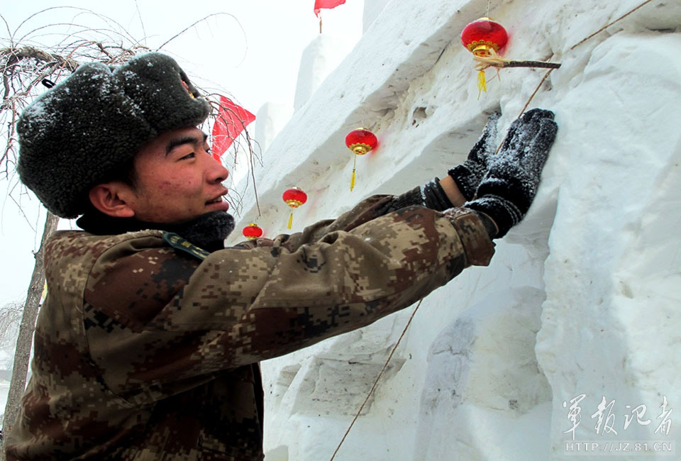 The officers and men of a regiment of the Shenyang Military Area Command (MAC) of the Chinese People's Liberation Army (PLA) carefully craft a snow Great Wall. After ten days efforts, a 120 meters long, three meters high snow Great Wall with a "Hexie" locomotive was completed in the barracks square. (China Military Online/Zhang Baojia, Tian Yabing)