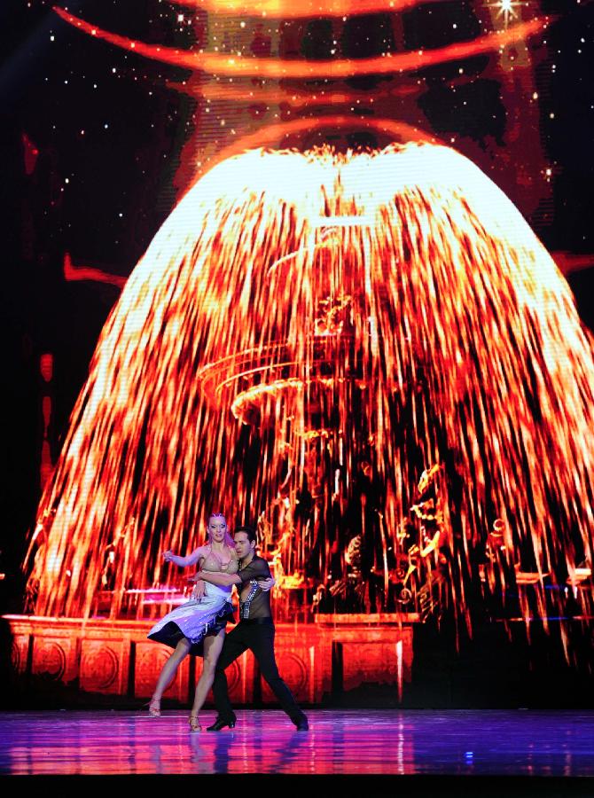 Actors perform at the opening ceremony of the 7th China Beijing International Cultural & Creative Industry Expo in Beijing, capital of China, Dec. 19, 2012. The five-day expo opened Wednesday night in Beijing. (Xinhua/Luo Xiaoguang) 