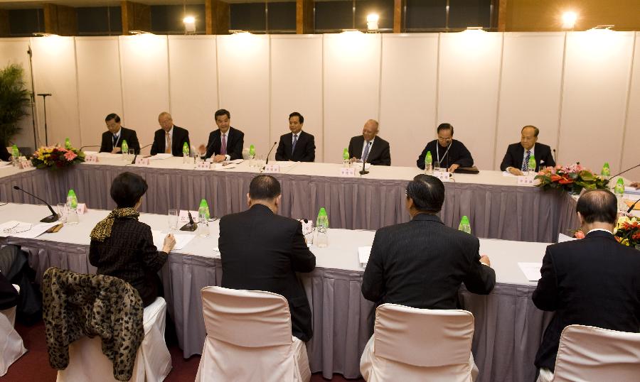 The third plenary session of the Conference for Electing Deputies of HKSAR to the 12th National People's Congress (NPC) is held in south China's Hong Kong, Dec. 19, 2012. Vice Chairman and Secretary-General of the NPC Standing Committee Li Jianguo attended the conference, which was presided by HKSAR Chief Executive CY Leung. (Xinhua/Lui Siu Wai)