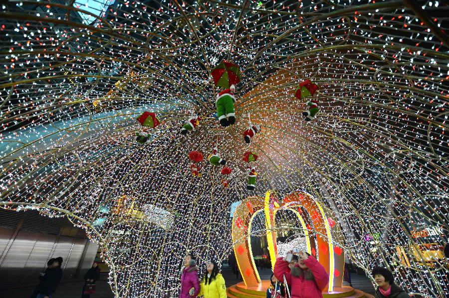 Christmas decorations are seen in downtown Jinan, capital of east China's Shandong Province, Dec. 19, 2012. (Xinhua/Zhu Zheng)