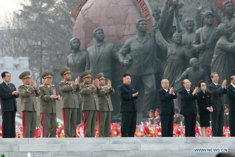 Democratic People's Republic of Korea (DPRK) leader Kim Jong Un (C) attends the unveiling ceremony in Pyongyang, DPRK, April 13, 2012. Kim Jong Un attended the unveiling ceremony of bronze statues of founding leader Kim Il Sung and late leader Kim Jong Il Friday. (Xinhua/Zhang Li) 