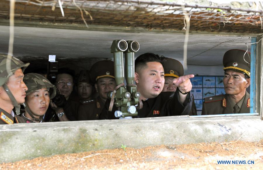 Photo provided by the Central News Agency (KCNA) of the Democratic People's Republic of Korea (DPRK) on Aug. 18, 2012 shows DPRK top leader Kim Jong Un gesturing as he inspects the island defence detachments stationed in the southernmost part of the southwest front. (Xinhua/KCNA) 