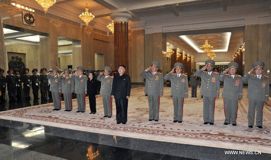 Photo released by Korean Central News Agency on Oct. 10, 2012 shows Kim Jong Un, top leader of the Democratic People's Republic of Korea (DPRK) paying respect to former top leaders of DPRK Kim Il Sung and Kim Jong Il at Kumsusan Palace of the Sun near Pyongyang, capital of DPRK. (Xinhua) 