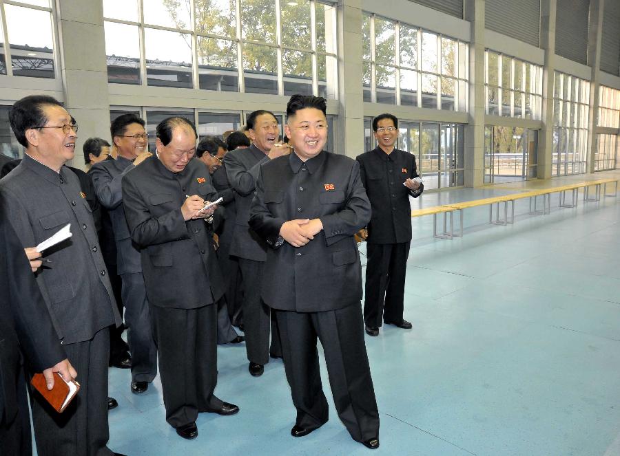 Photo released by Korean Central News Agency (KCNA) on Nov. 5, 2012 shows Kim Jong Un (R, front), top leader of the Democratic People's Republic of Korea (DPRK), inspecting a skating rink in Pyongyang on Nov. 3. (Xinhua/KCNA) 