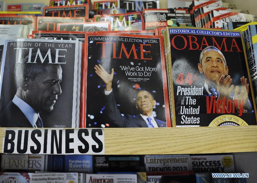 Photo taken on Dec. 21, 2012 in Washionton shows the Time magazine with the cover of Obama (L) who is the person of the year in 2012. Time magazine on Wednesday named the recently re-elected US President Barack Obama as its person of the year for 2012 -- the second time it has accorded him this honor. (Xinhua/Zhang Jun)