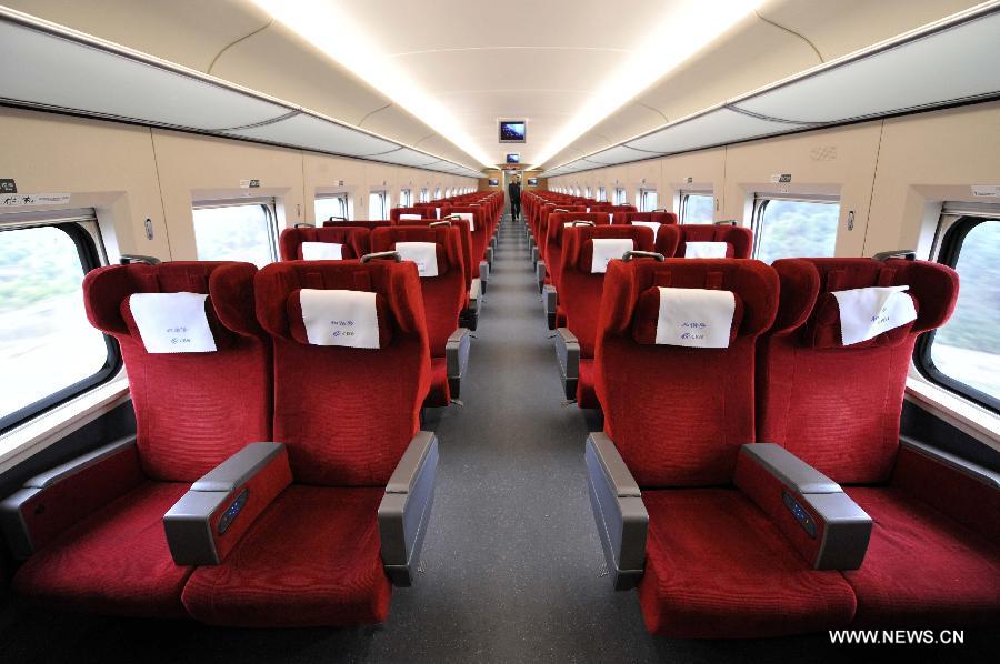 The interior of the first-class carriage on G80 express train is pictured during a trip to Beijing, capital of China, Dec. 22, 2012. (Xinhua/Chen Yehua) 