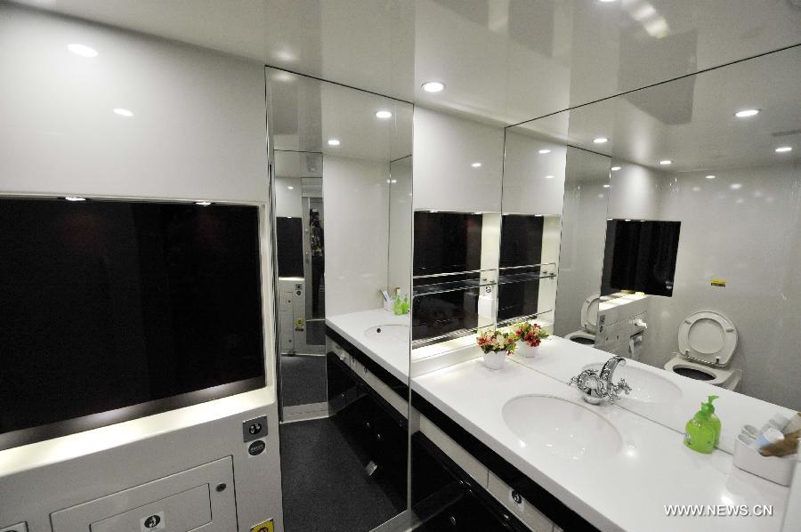 The interior of a toilet on G80 express train is pictured during a trip to Beijing, capital of China, Dec. 22, 2012.