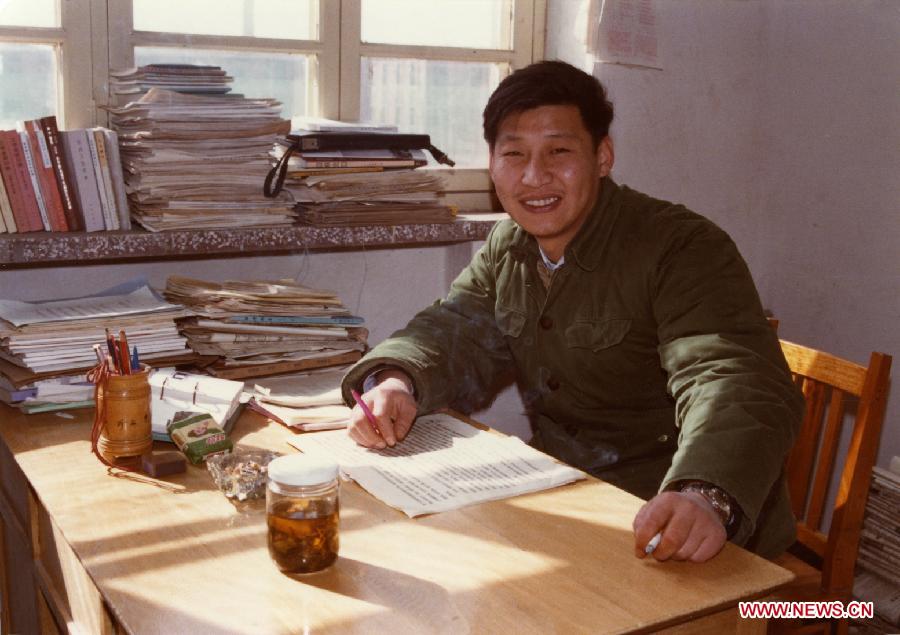 File photo taken in 1983 shows Xi Jinping poses for photo as he sits in his office in Zhengding County, north China's Hebei Province. (Xinhua) 
