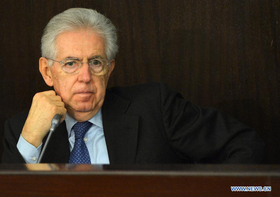 Italy's resigned Prime Minister Mario Monti attends a press conference in Rome. Italy, Dec. 23, 2012. Monti said in the press conference that, being a senator for life, he would not back any political parties, but if some forces supporting his anti-crisis "agenda" and ask him to head the next government, he would "consider it." (photo/Xinhua)