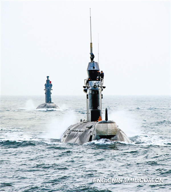 The submarines of a submarine flotilla of the North China Sea Fleet under the Navy of the Chinese People's Liberation Army (PLA) are conducting formation navigation training in the sea on December 13, 2012. (China Military Online/Wu Zhenping)