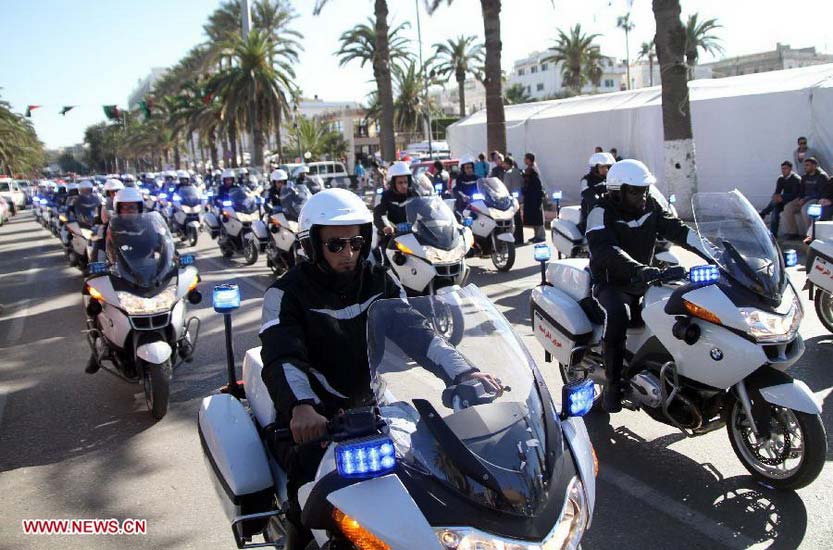 Libyan police officers attend a parade to mark the 61st anniversary of Independence Day at Martyrs' Square in Tripoli, Libya, Dec. 24, 2012. (Xinhua/Hamza Turkia) 