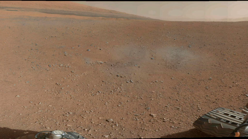 The photo released by NASA on Aug. 9, 2012 shows the landing point of Mars rover Curiosity. Loaded with the most-sophisticated instruments, it touched down on the Red Planet on Aug. 6. During the next two years, Curiosity will investigate whether conditions have been favorable for microbial life and for preserving clues in the rocks about possible past life. (Xinhua/AFP)