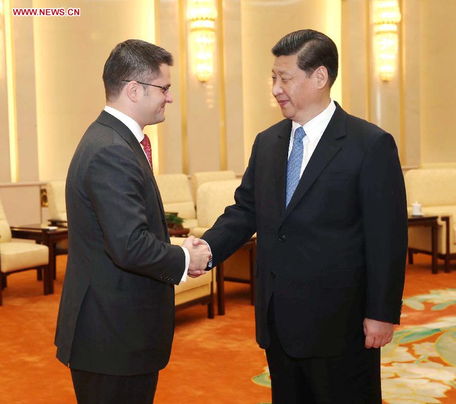 Xi Jinping (R), general secretary of the Communist Party of China (CPC) Central Committee, shakes hands with Vuk Jeremic, president of the 67th Session of the UN General Assembly, in Beijing, capital of China, Dec. 27, 2012. (Xinhua/Liu Weibing) 