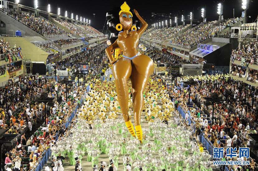 People take part in a parade along the Sambandrome in Rio De Janeiro, Brazil on Feb. 20, 2012. (Xinhua/Wen Xinyang)