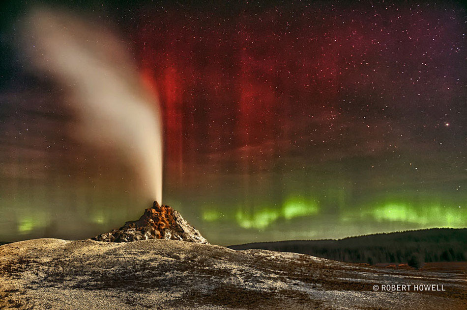 Aurora Over White Dome Geyser. Sometimes both heaven and Earth erupt. Colorful aurorae erupted unexpectedly earlier this month, with green aurora appearing near the horizon and brilliant bands of red aurora blooming high overhead. (NASA/ Robert Howell)