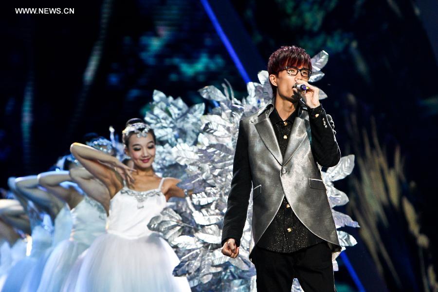 Singer Xu Song performs during a rehearsal of the China Central Television (CCTV)'s 2013 New Year Gala in Beijing, capital of China, Dec. 30, 2012. The gala will be shown in the evening of Dec. 31. (Xinhua/Zheng Huansong) 