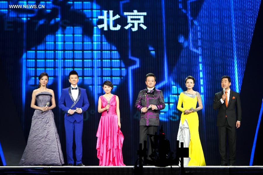 Hosts attend a rehearsal of the China Central Television (CCTV)'s 2013 New Year Gala in Beijing, capital of China, Dec. 30, 2012. The gala will be shown in the evening of Dec. 31. (Xinhua/Zheng Huansong) 