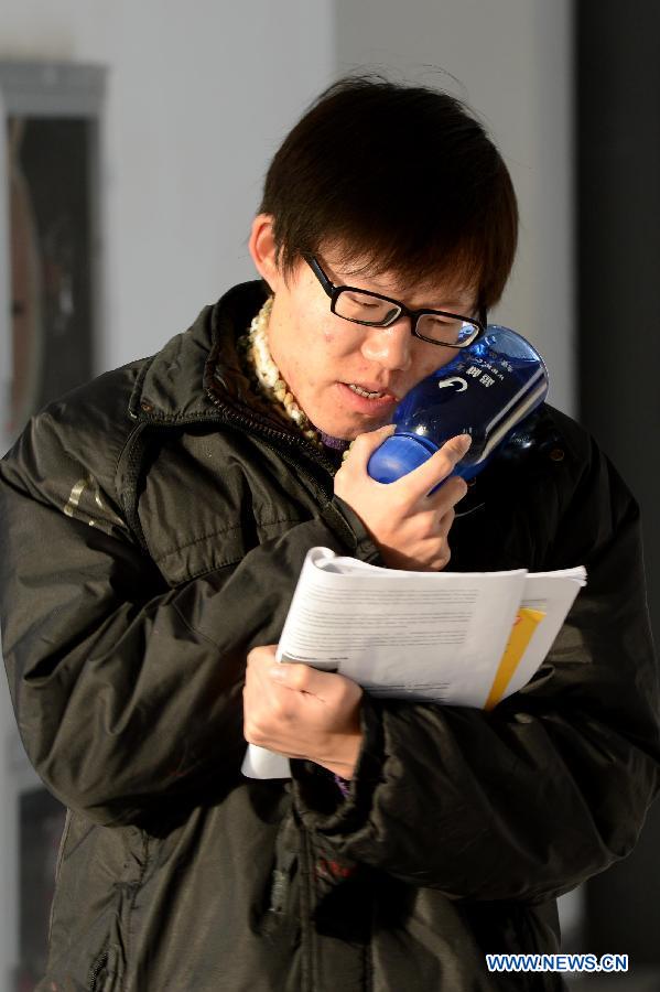 A student prepares for the upcoming National Entrance Examination for Postgraduate (NEEP) at a corridor in Anhui University in Hefei, capital of east China's Anhui Province, Dec. 30, 2012. Examinees taking the NEEP scheduled on Jan. 5 have rocketed up to 1.8 million this year, hitting an all-time high. (Xinhua/Zhang Rui) 