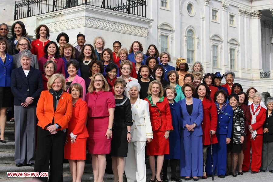 Women Members of the Democratic Caucus pose for a group photo on Capitol Hill in Washington, the United States, on January 3, 2012 to highlight the historic diversity of the House Democratic Caucus in the 113th Congress and celebrate the increased number of women joining the Democratic Caucus. (Xinhua/Fang Zhe) 
