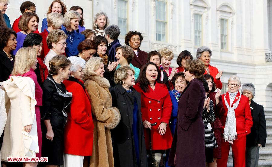 US House Democratic Leader Nancy Pelosi (5th-R) greets the the Women Members of the Democratic Caucus on Capitol Hill in Washington, the United States, on January 3, 2012 before a group photo which highlight the historic diversity of the House Democratic Caucus in the 113th Congress and celebrate the increased number of women joining the Democratic Caucus. (Xinhua/Fang Zhe) 