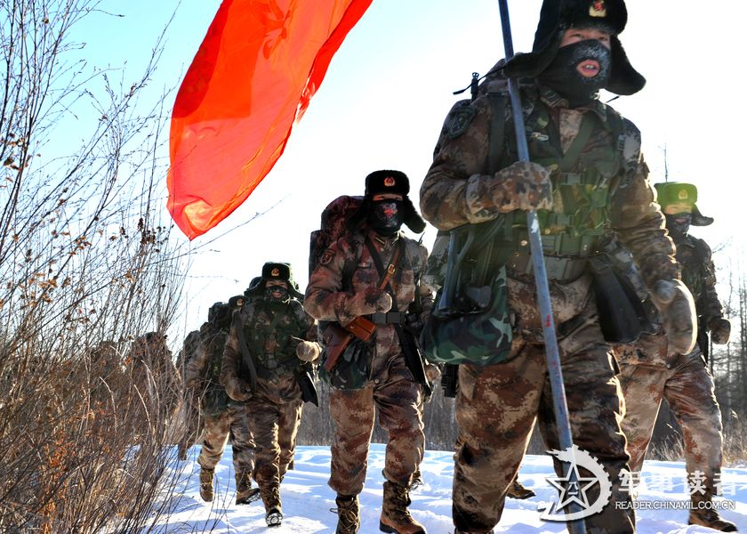 In late December 2012, a garrison regiment conducts a drill deep in the Greater Hinggan mountains of Heilongjiang province. The soldiers went through many hard exercises although the temperature dipped to 40 degrees Celsius below zero. (Photo/ reader.chinamil.com.cn)