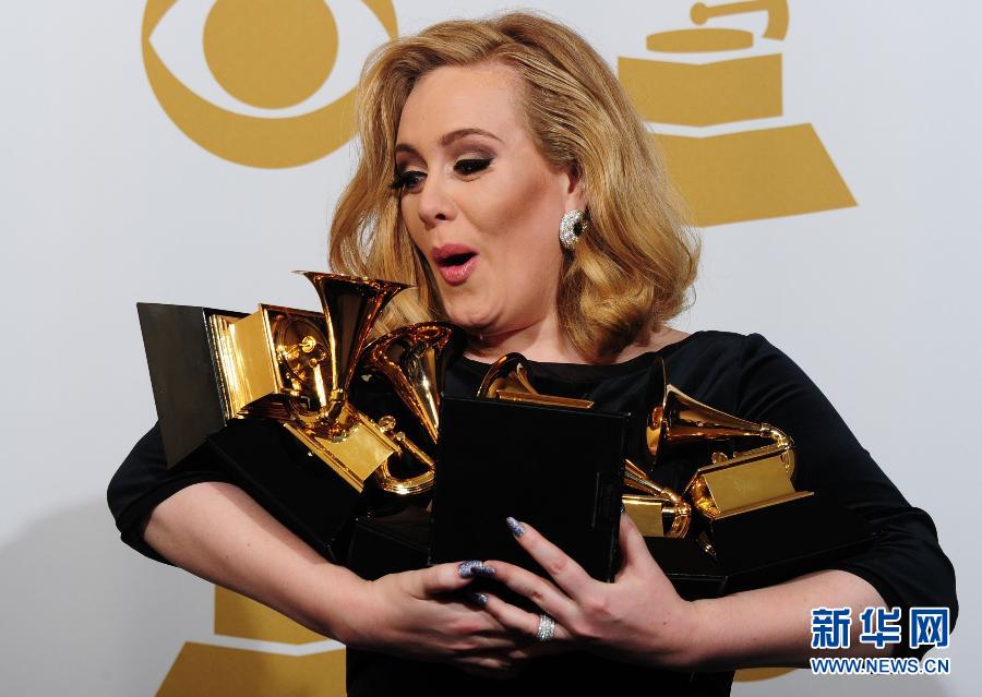 British singer Adele wins all six categories she was nominated at the Grammy Awards in Los Angeles, U.S. on Feb. 12, 2012. She won the song of the year with Rolling In the Deep, which she performed to a standing ovation. She also received Grammys for best pop solo performance, best pop vocal album and album of the year for 21, and record of the year and best short form music video for Rolling In the Deep. (Xinhua/AFP)
