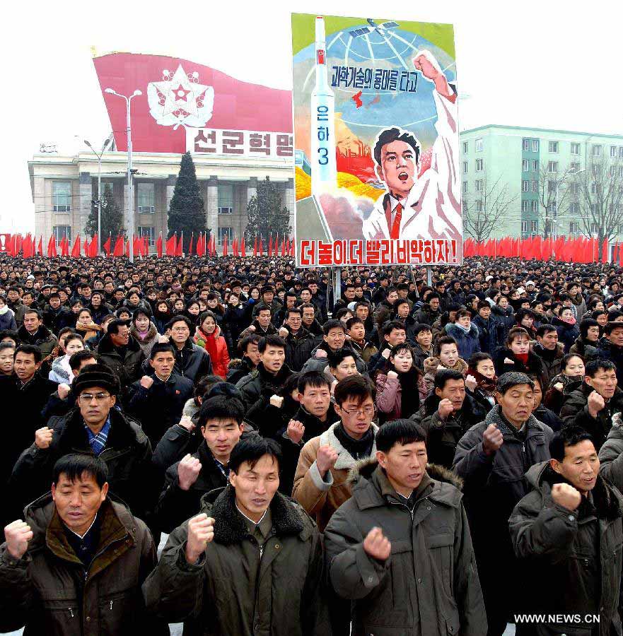 This photo provided by KCNA on Jan. 5, 2013, shows citizens of Pyongyang vowing to implement what top leader Kim Jong Un has urged in his New Year address in Pyongyang, the Democratic People's Republic of Korea (DPRK). Kim Jong Un urged his people to build the country into an economic giant in his New Year address on Tuesday. (Xinhua/KCNA) 