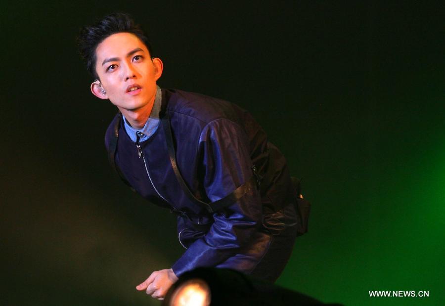 Singer Yoga Lin from China's Taiwan performs at his tour concert held in Nanjing, capital of east China's Jiangsu Province, Jan. 5, 2013. Lin started his career as the first ever champion of the most popular Taiwan TV music competition show "One Million Star". (Xinhua) 