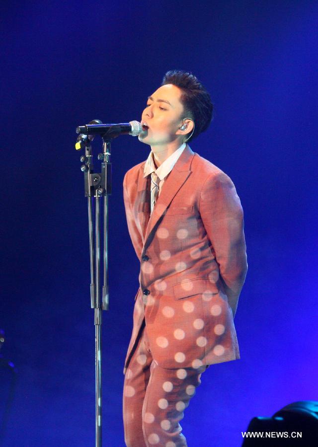 Singer Yoga Lin from China's Taiwan performs at his tour concert held in Nanjing, capital of east China's Jiangsu Province, Jan. 5, 2013. Lin started his career as the first ever champion of the most popular Taiwan TV music competition show "One Million Star". (Xinhua) 
