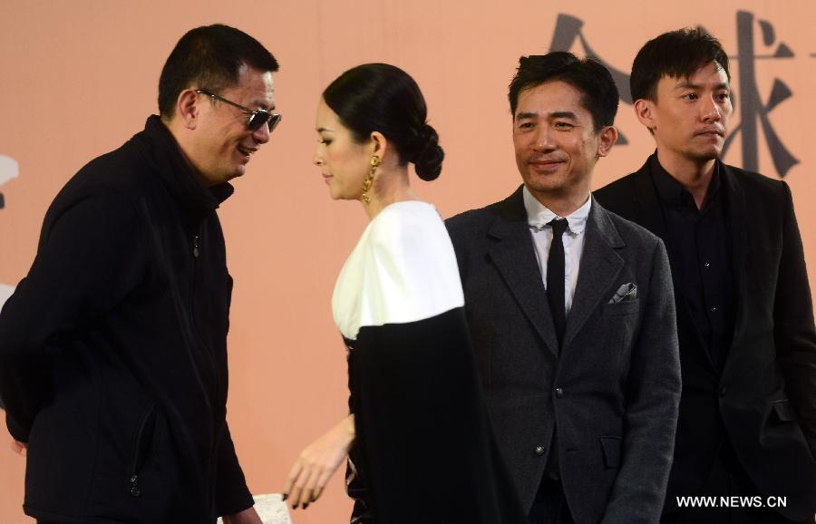 Hong Kong director Wong Kar Wai (L) and cast members Zhang Ziyi, Tony Leung and Chang Chen (2nd L to R) attend the premiere ceremony of Wong's new film "The Grandmaster" in Beijing, capital of China, Jan. 6, 2013. The film will be released on Tuesday. (Xinhua/Jin Liangkuai)