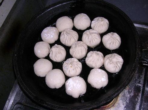 Pan-Fried Steamed Bun (www.cyol.net)