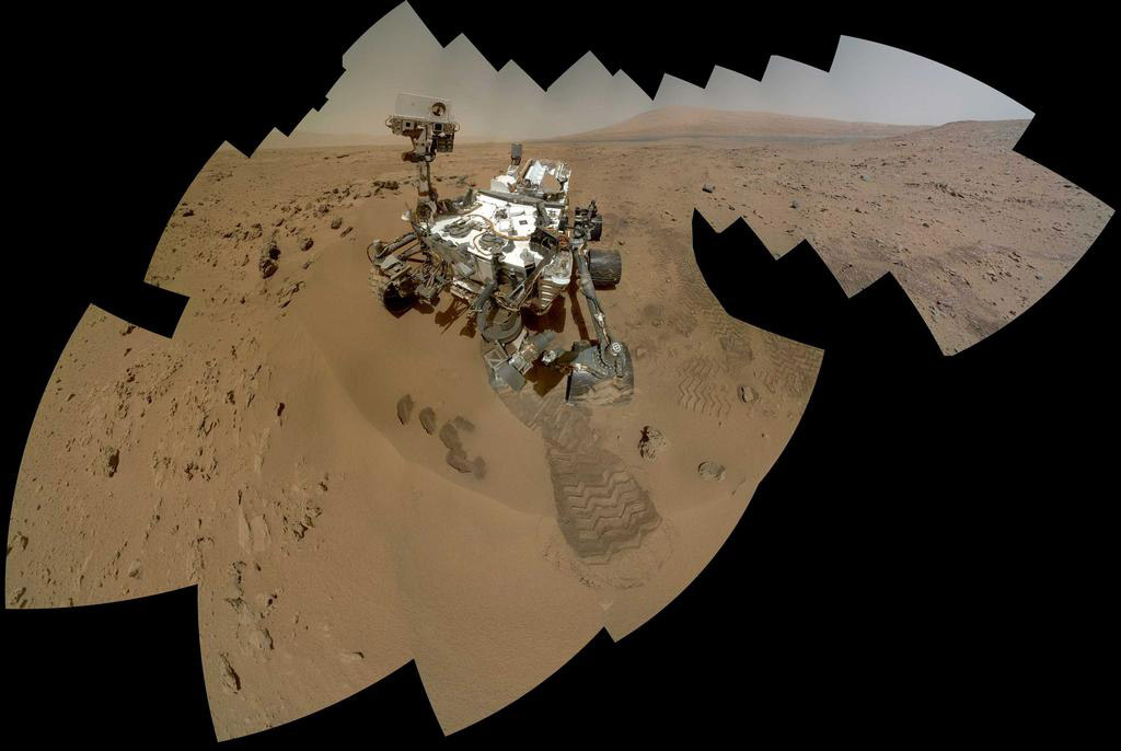 This file image provided by NASA shows a color self-portrait of the Mars rover Curiosity. It is set to drive toward a Martian mountain in mid-February after drilling into a rock. (Photo/People's Daily Online)