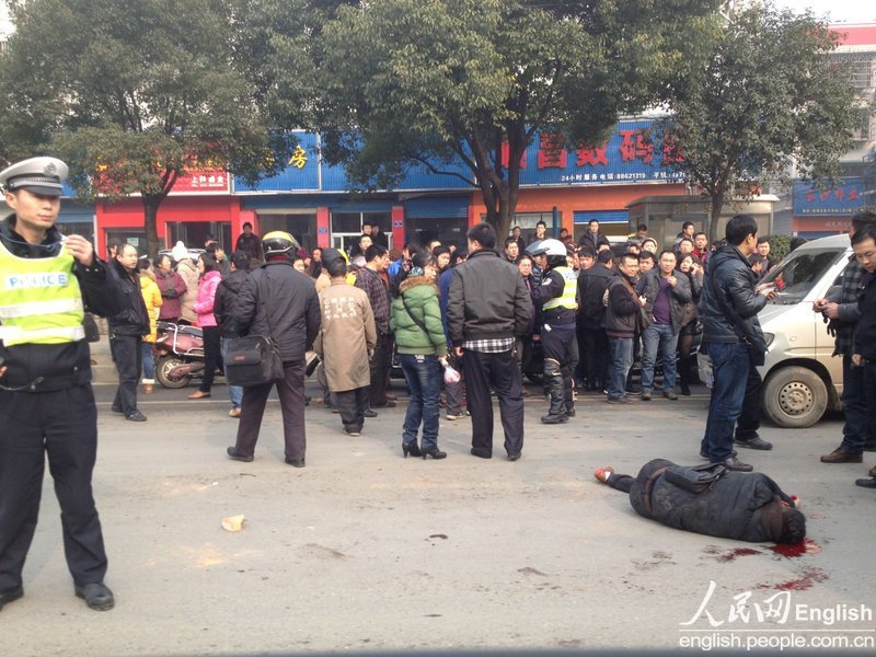 A gunshot case is reported in a street in Changsha, Hunan province on Thursday morning. A man is found with a gunshot wound to the head and another is hit on the head by bricks. The conditions of the two wounded still remain unclear. (Photo/CFP)