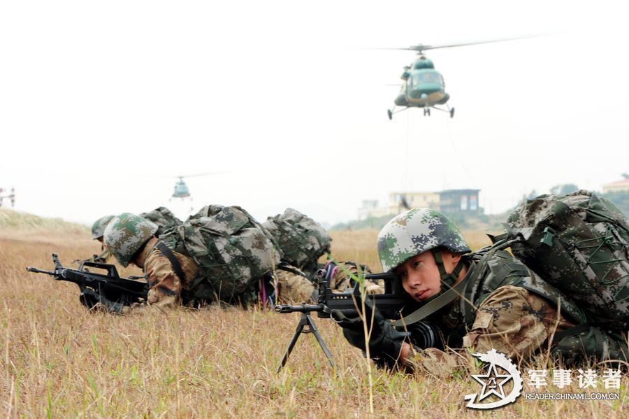 A division under the Nanjing Military Area Command (MAC) of the Chinese People's Liberation Army (PLA) organizes a helicopter air-landing training, in a bid to all-roundly temper troops' actual-combat and rapid delivery capability. (China Military Online/Xiao Qingming)