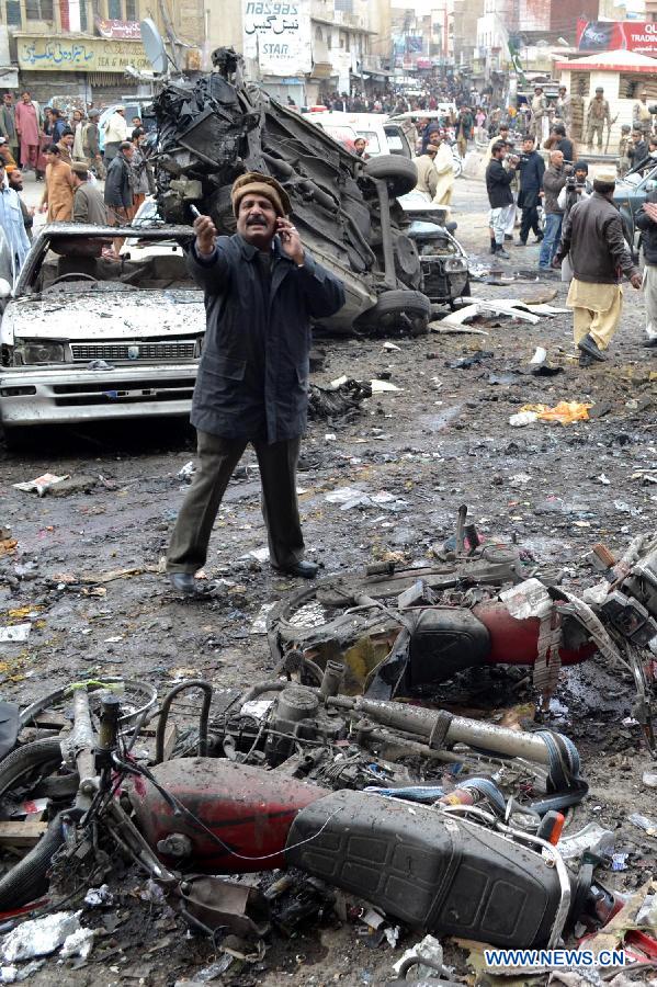  People gather at the blast site in Quetta, southwest Pakistan, Jan. 10, 2013. (Xinhua/Mohammad) 