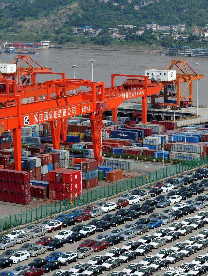 File photo taken on July 30, 2012 shows a bonded port in southwest China's Chongqing. According to the latest statistics released by the General Administration of Customs, China's total foreign trade volume in 2012 reached more than 3.86 trillion U.S. dollars, growing by 6.2 percent year on year. The growth rate is 16.3 percentage points less than 2011. (Xinhua/Li Jian)