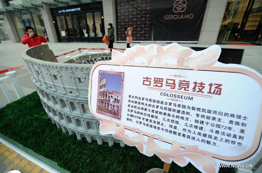 A miniature monument of Colosseum is seen on a street in Xi'an, capital of northwest China's Shaanxi Province, Jan. 10, 2013. A collection of miniatures of 10 world cultural heritages are on show here. (Xinhua/Li Yibo)