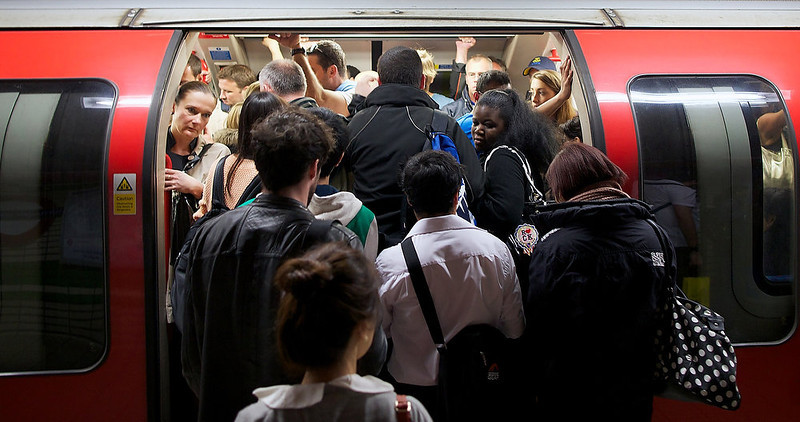 In the photo taken Tuesday, Jan. 8, 2013, people walk by Farringdon underground station, in London. The world's first subway system marked its 150th anniversary Wednesday, Jan. 9, 2013, with reports showing conditions way back when were much as they are today: Busy, congested and stressful for passengers. (People's Daily Online/AP)