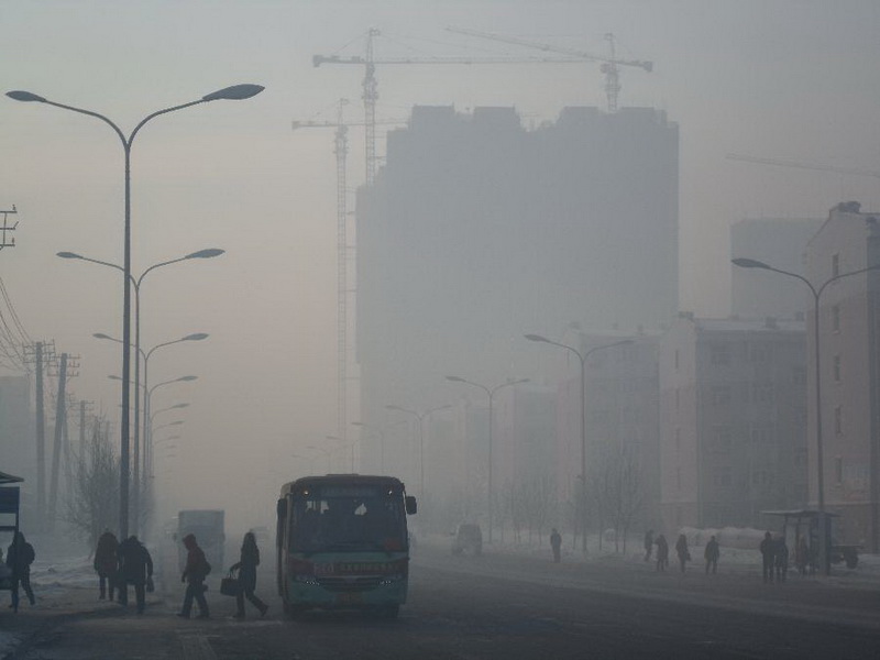 Photo taken on Jan. 13, 2013 shows the fog-shrouded urban area in Qiqihar, northeast China's Heilongjiang Province. Dense fog on Sunday hit China's east and central regions from the northeast to the south, causing serious air pollution. (Xinhua/Wang Yunlong) 