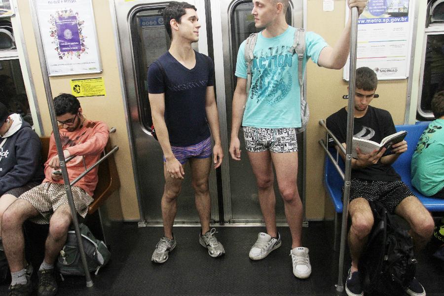 People without their pants take part in the annual "No Pants Subway Ride" in Sao Paulo, Brazil, on Jan. 13, 2013. (Xinhua/Rahel Patrasso)