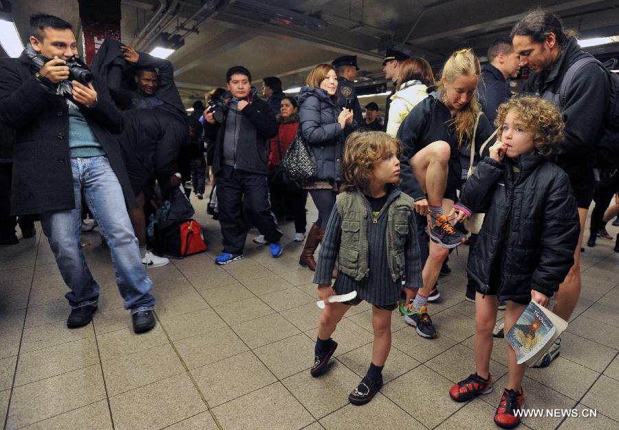 Participants take part in the No Pants Subway Ride in New York, the United States, on Jan. 13, 2013. (Xinhua/Wang Lei)