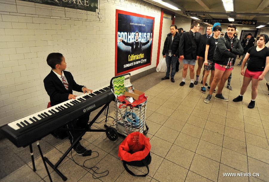 Participants take part in the No Pants Subway Ride in New York, the United States, on Jan. 13, 2013. (Xinhua/Wang Lei)