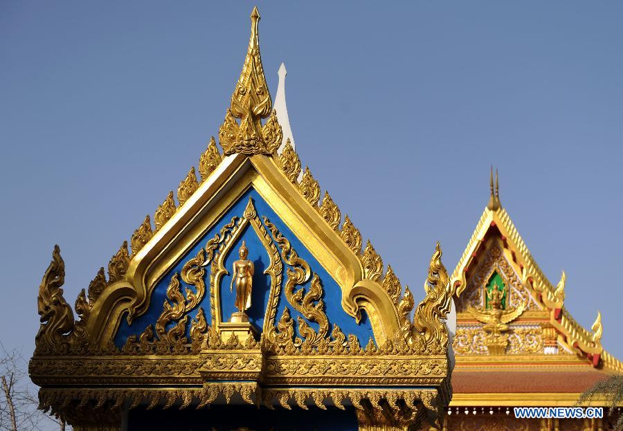 Photo taken on Dec. 31, 2012 shows the Thai-style construction at the Baima Temple, or the White Horse Temple, in Luoyang City, Central China's Henan Province. Visitors can see Buddha halls with different styles of foreign countries at the Baima Temple, the oldest Buddhist temple in China.(Xinhua/Li Bo) 