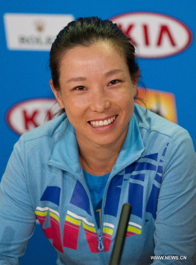 Zheng Jie of China attends a press conference after winning the 1st round women's singles match against Zhang Yuxuan of China on the first day of 2013 Australian Open tennis tournament in Melbourne, Australia, Jan. 14, 2013. Zheng Jie won 2-1. (Xinhua/Bai Xue) 