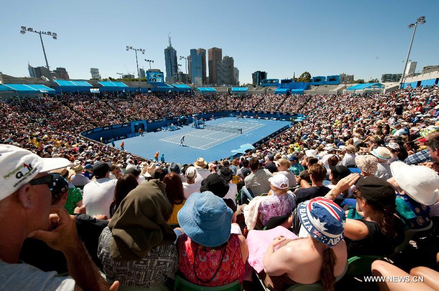 Spectators watch the match at Margaret Court Arena on the first day of 2013 Australian Open tennis tournament in Melbourne, Australia, Jan. 14, 2013. (Xinhua/Bai Xue)