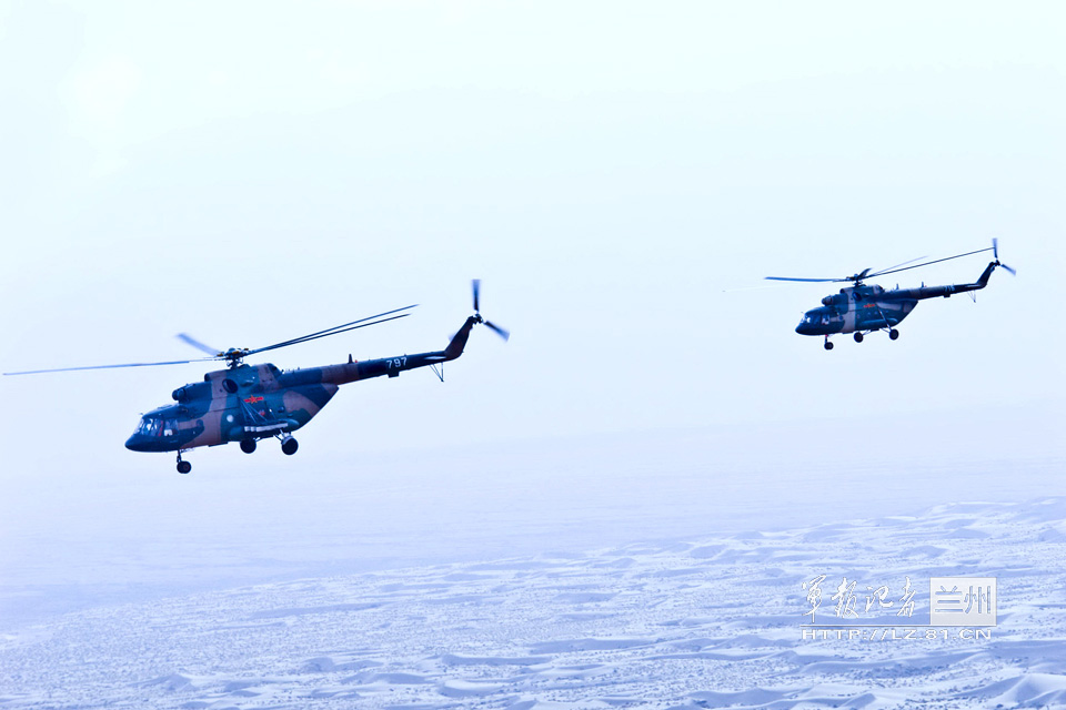 An army aviation brigade under the Lanzhou Military Area Command (MAC) of the Chinese People's Liberation Army (PLA) organizes flight training at an airport in the new year, in a bid to temper the tactical skills of warplane pilots and the helicopter operation-and-control capability. (China Military Online/Jia Baohua)