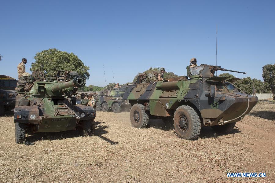 The photo released on Jan. 16, 2013 by French Army Communications Audiovisual office (ECPAD) shows French armored vehicles making their way north of Bamako, in Mali. French ground forces were heading towards Mali's northern region to help local authorities to retake the area from Islamist rebels, Defense Minister Jean-Yves Le Drian said Wednesday. (Xinhua/ECPAD)