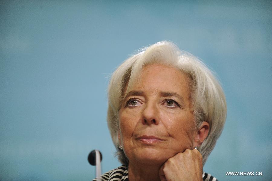 Managing Director of the International Monetary Fund (IMF) Christine Lagarde attends a news conference on the outlook of global economy in 2013 in Washington D.C., Jan. 17, 2013. There is a lot of work left to do to bolster global economic recovery despite some important steps taken in key economies to reduce financial and fiscal risks, Christine Lagarde said here on Thursday. (Xinhua/Wang Yiou) 